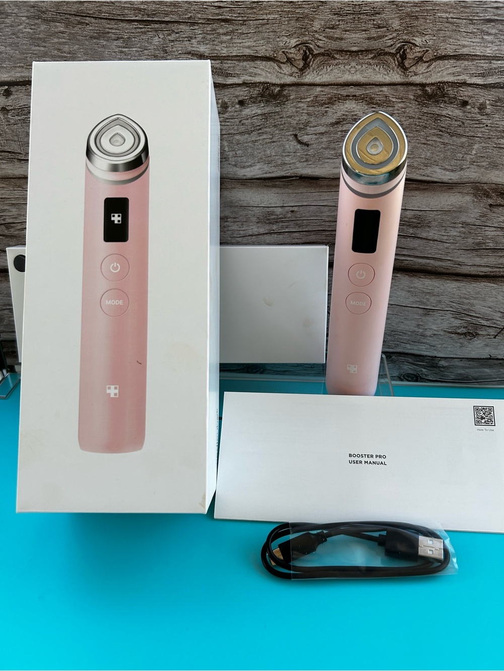Portable Pink Facial Booster Pro Device